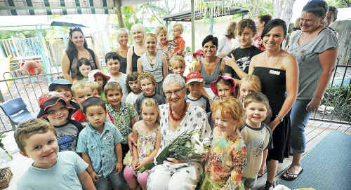 Possums’ Den president, Pauline Pryor, celebrates her achievement with enthusiastic children, parents and colleagues. Possums’ Den president, Pauline Pryor, celebrates her achievement with enthusiastic children, parents and colleagues.